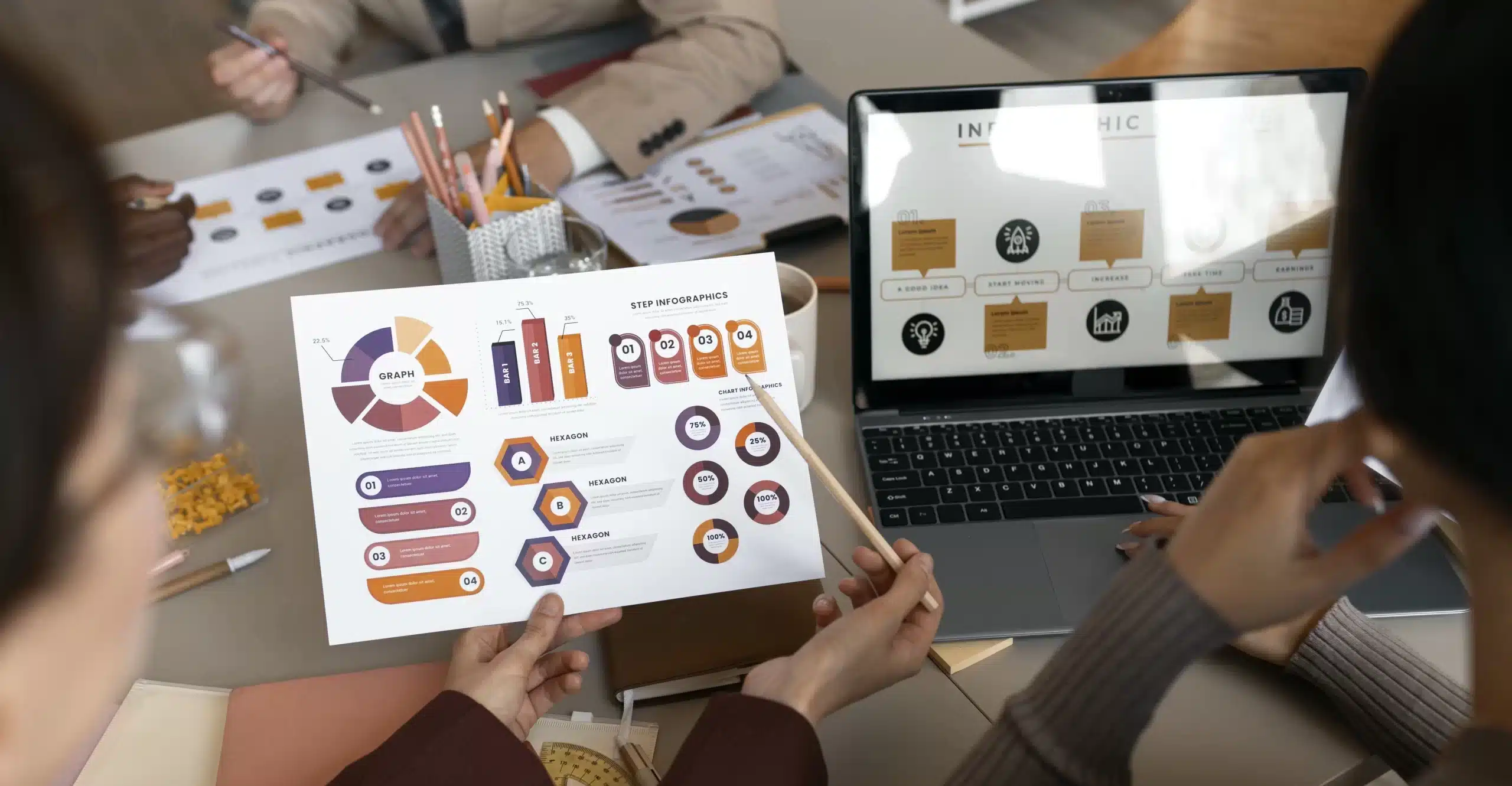 high angle people working with laptop scaled e1709852359785